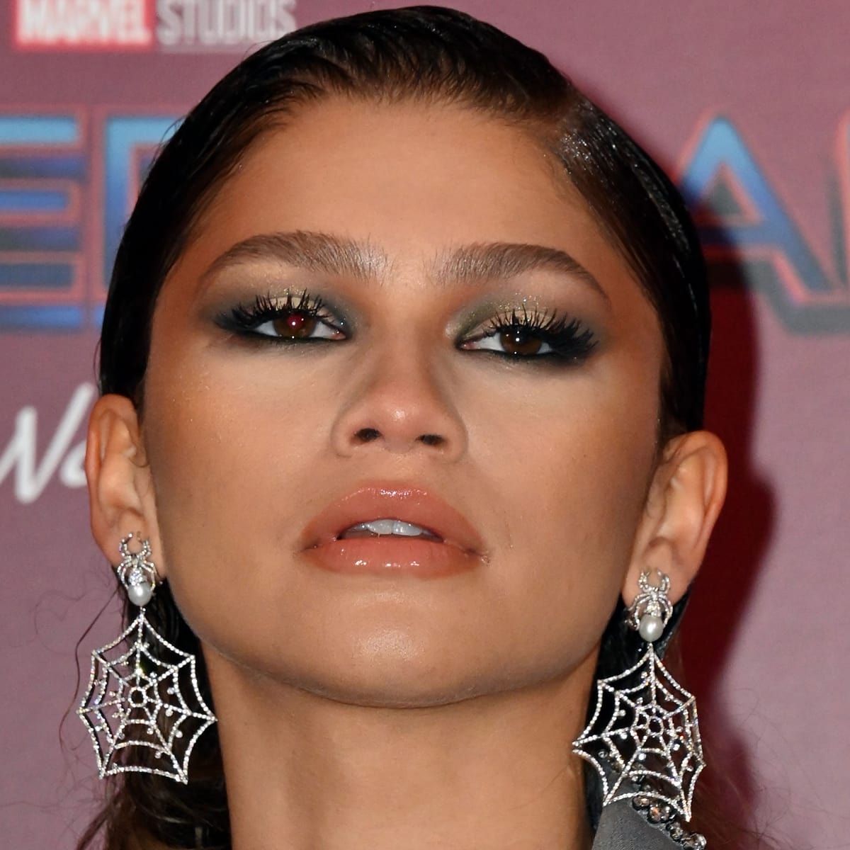 Zendaya's spiderweb earrings by Jacob & Co. feature two white pearl-and-diamond spiders
