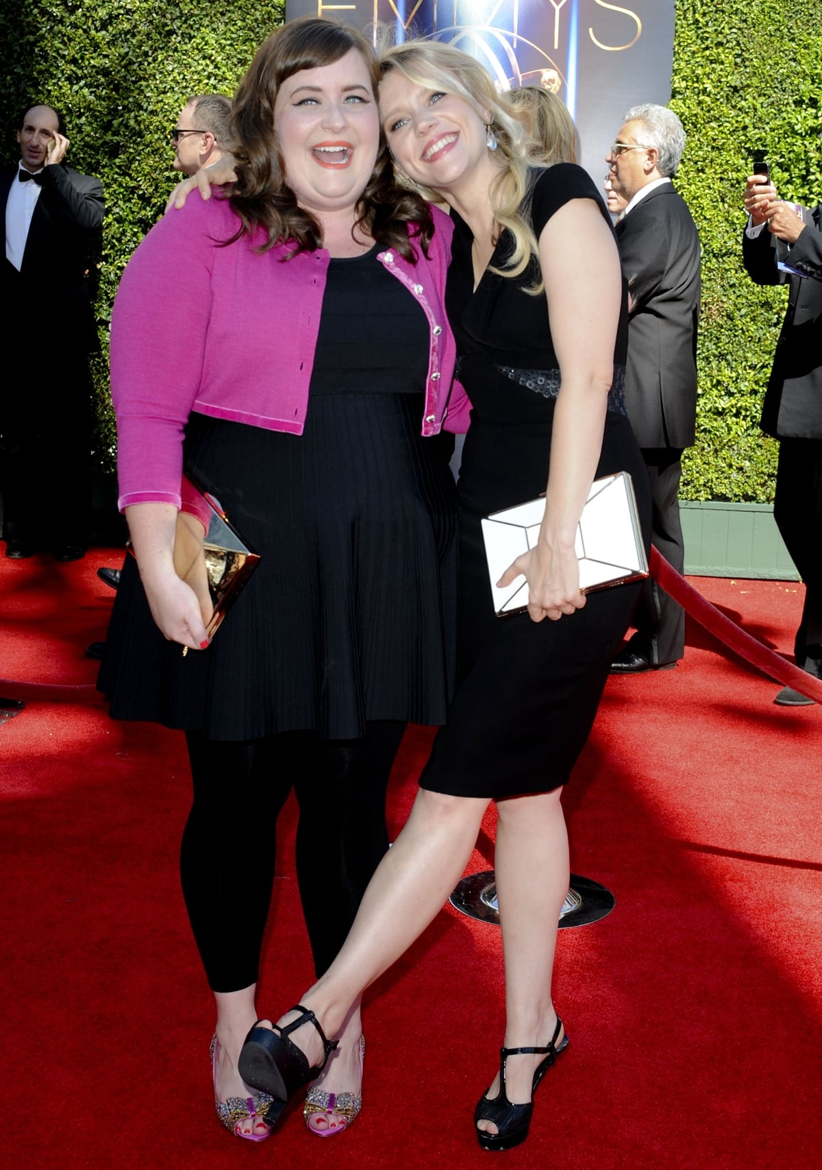 SNL veterans Aidy Bryant (L) and Kate McKinnon attend the 2014 Creative Arts Emmy Awards
