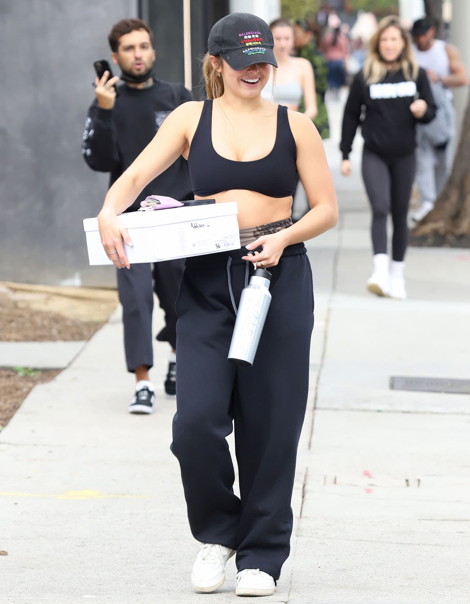 Addison Rae shows off her stomach and cleavage as she leaves Dogpound gym in West Hollywood on January 17, 2022