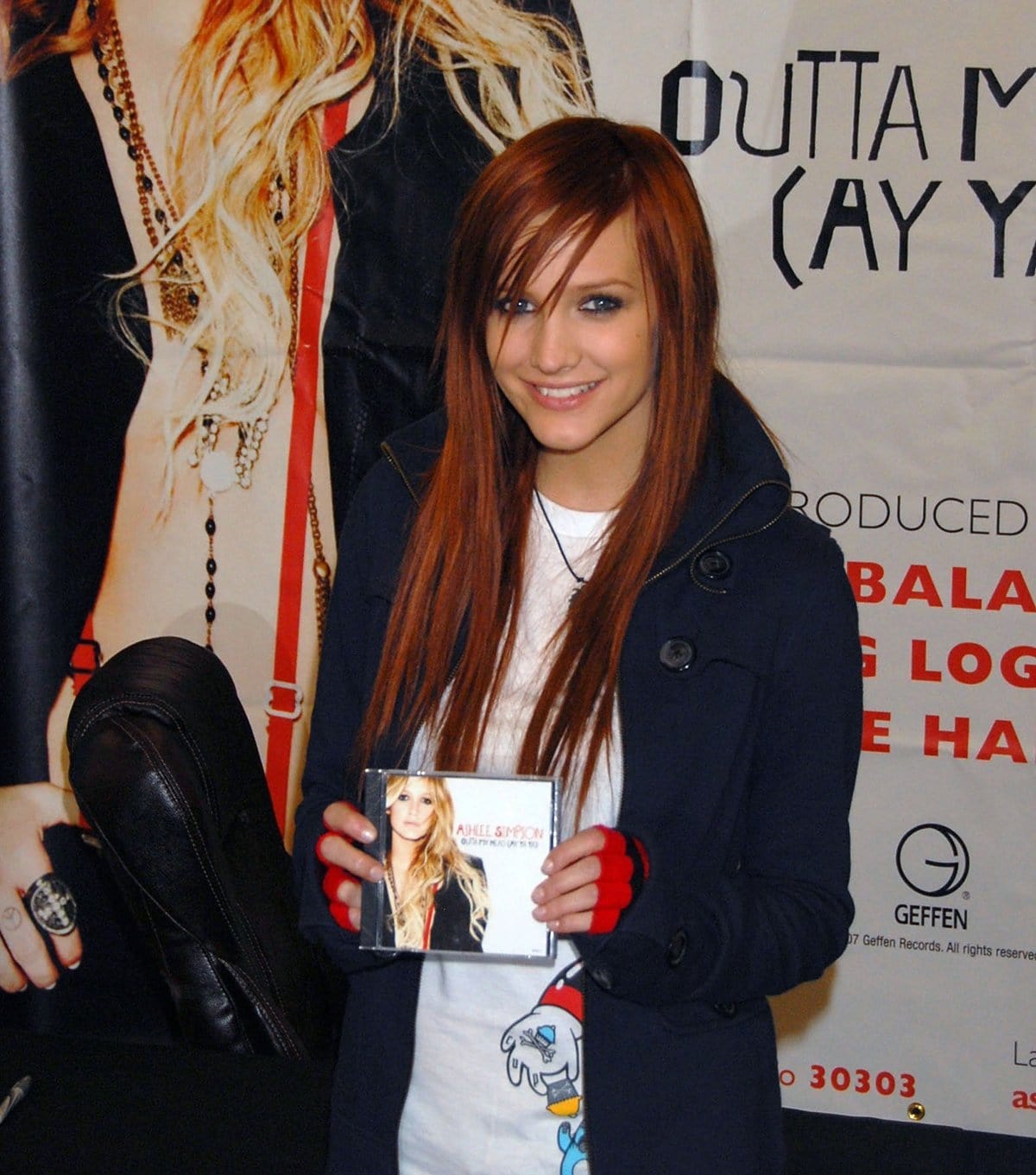 American singer Ashlee Simpson promotes the 2007 song "Outta My Head (Ay Ya Ya)" from her third studio album Bittersweet World