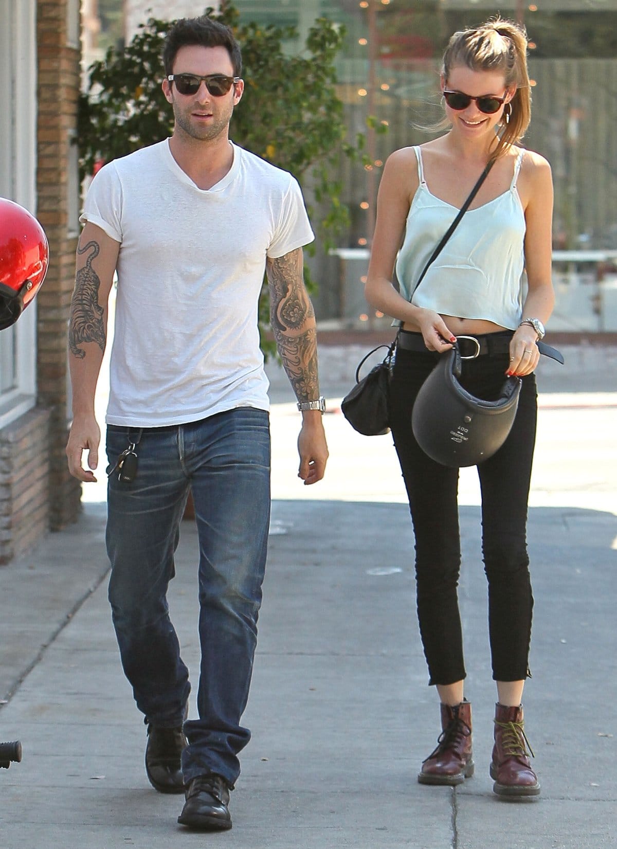 Behati Prinsloo started dating Adam Levine in May 2012 and married in Mexico on July 19, 2014