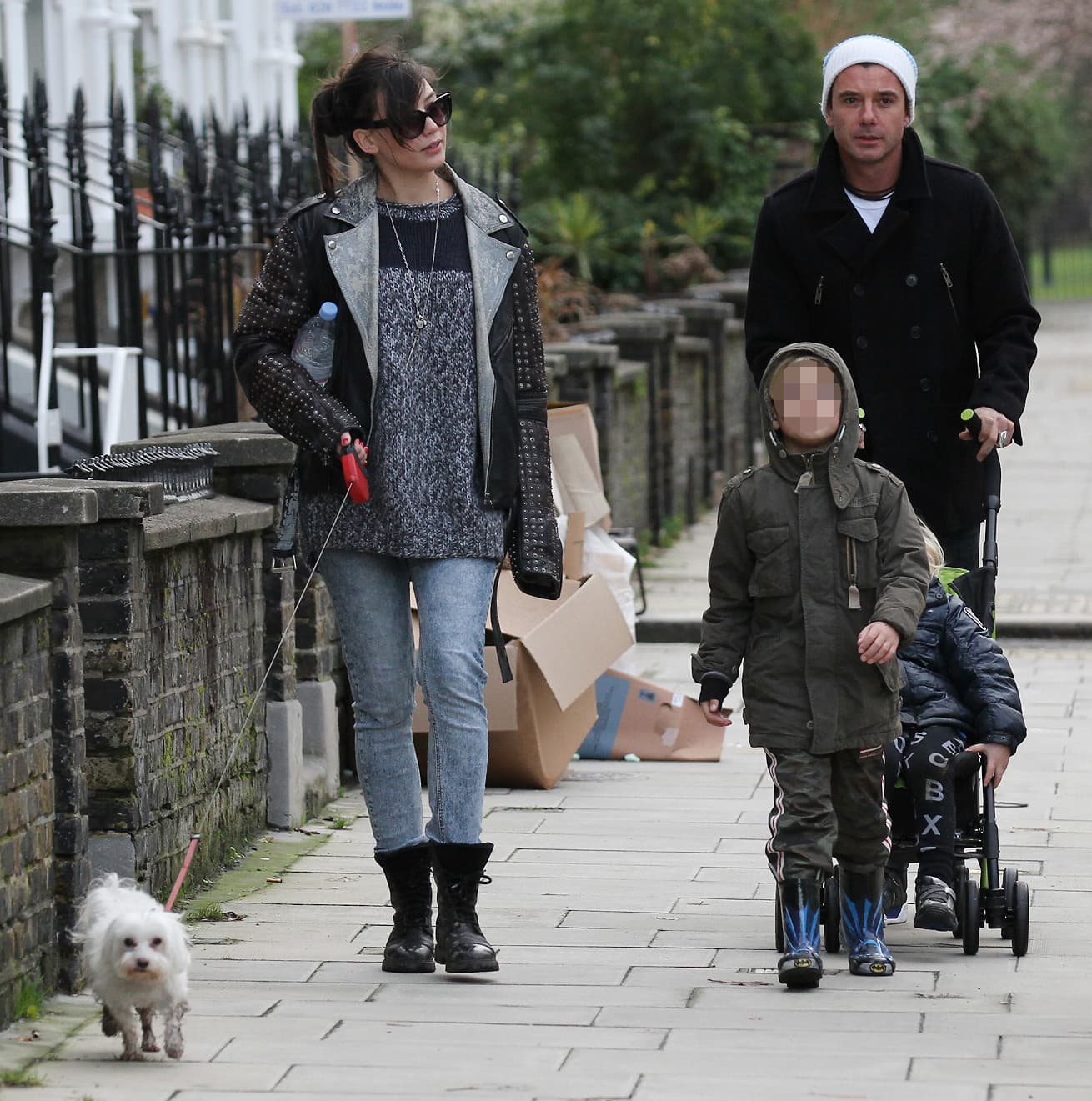 Daisy Lowe with her adopted dog Monty, dad Gavin and his kids with Gwen Stefani in Primrose Hill, London on December 23, 2012