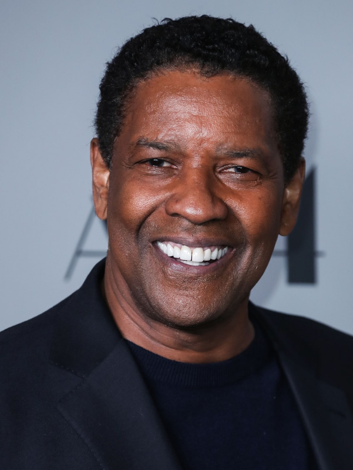 Denzel Washington's father was a Pentecostal preacher who belonged to the Church of God in Christ denomination
