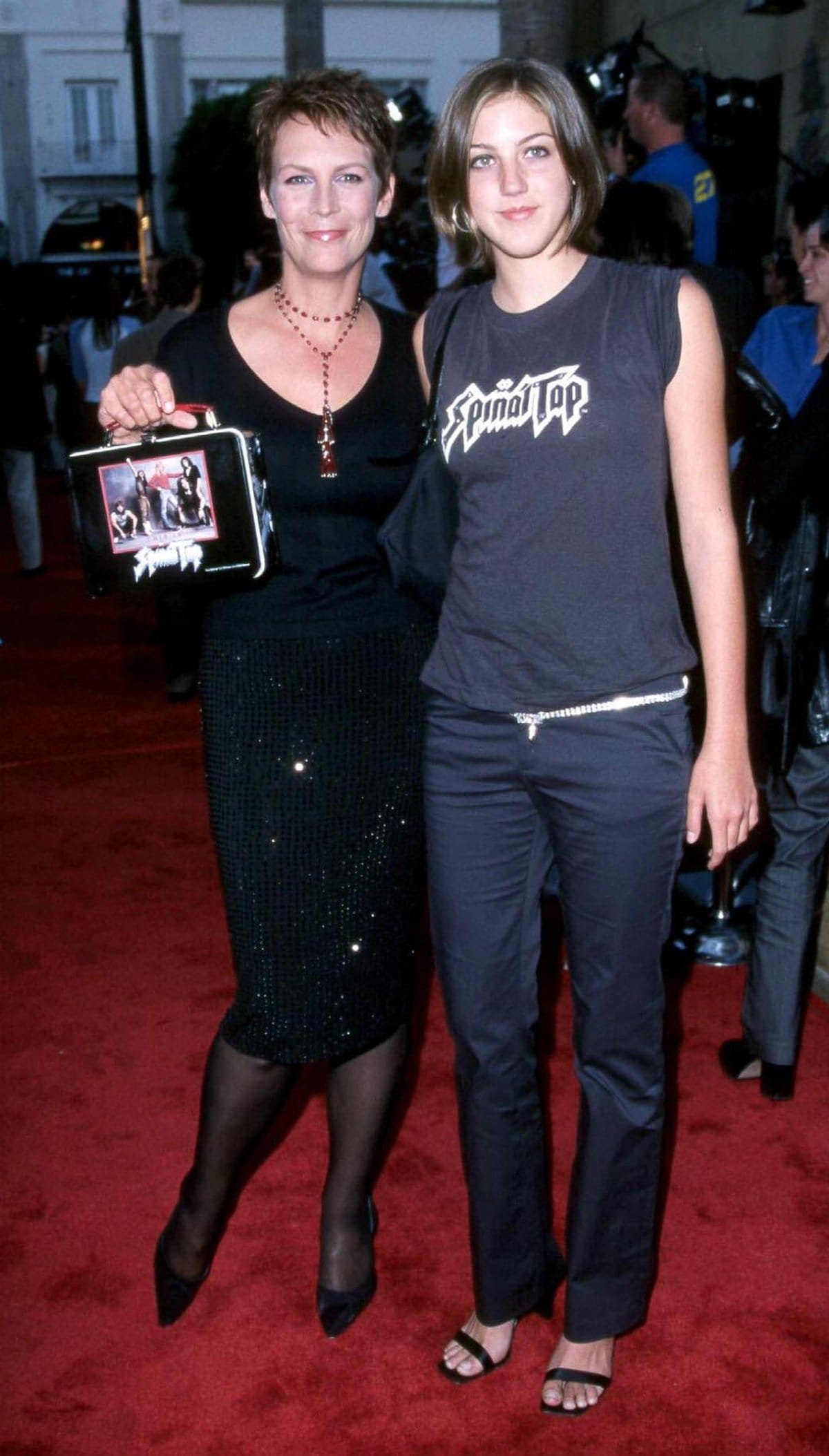 Actress Jamie Lee Curtis and her adopted daughter Annie arrive at the premiere of the re-release of "This Is Spinal Tap"