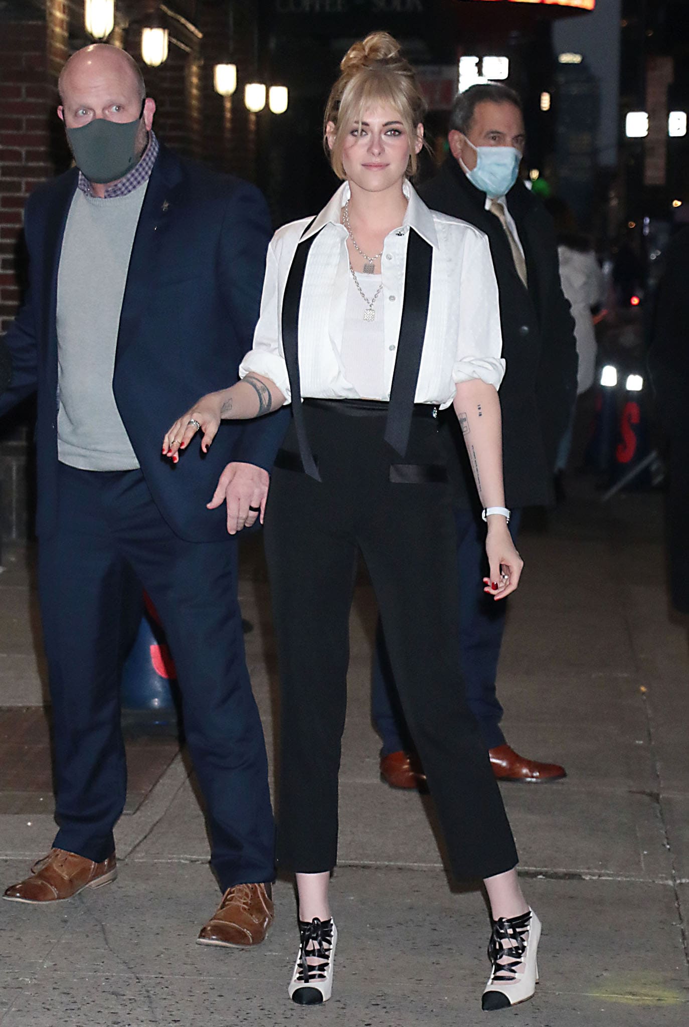 Kristen Stewart shows her rock-chic side in a black-and-white Chanel shirt and pants
