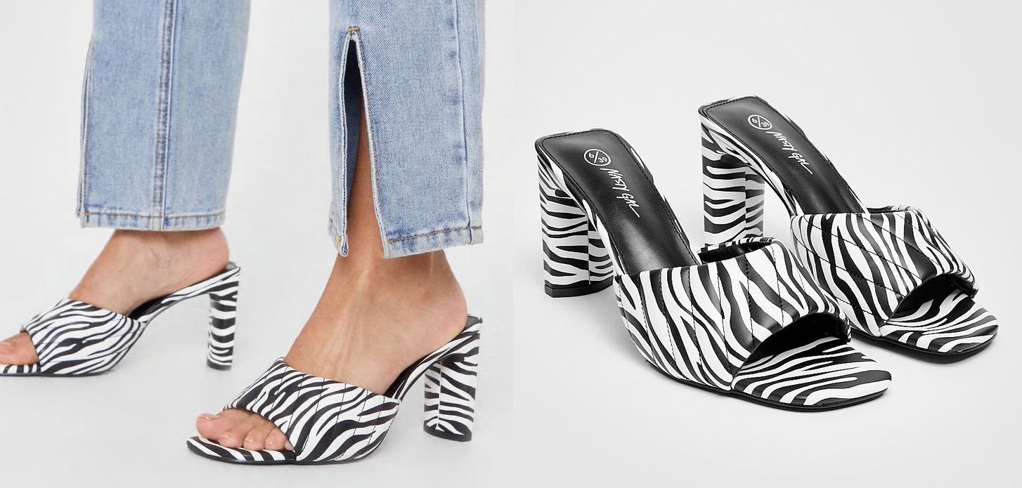 Minimalist yet striking, Nasty Gal's zebra-print mules come in faux leather and feature about 3.5-inch block heels