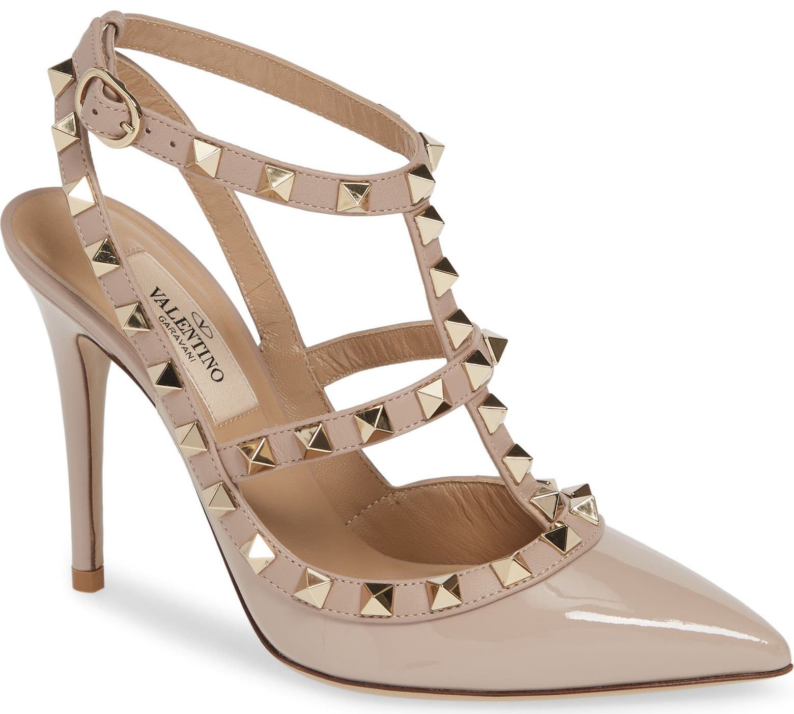 These Valentino pumps have signature pyramid studs that trim the caged upper design