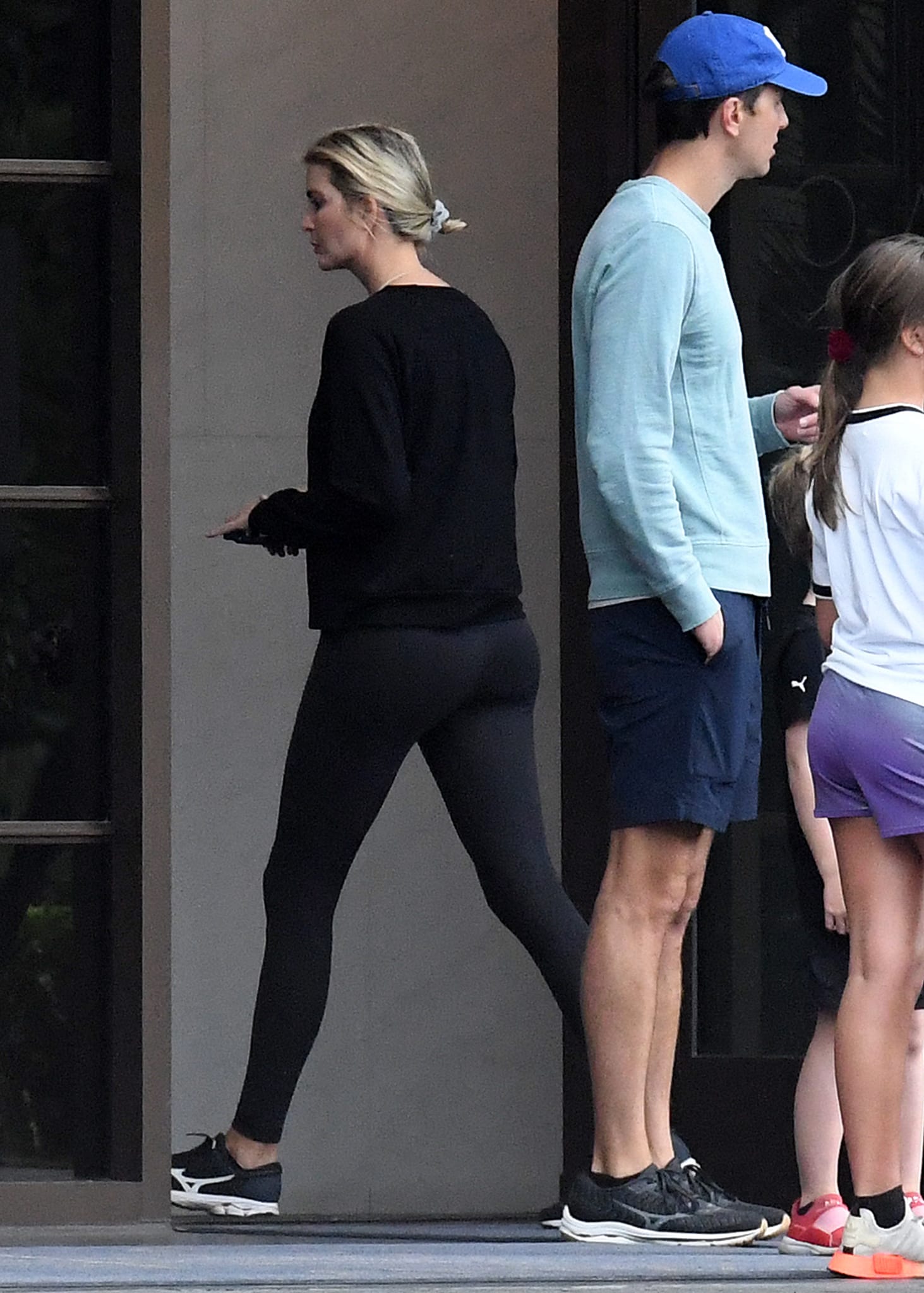 Ivanka Trump shows how to pair a long-sleeved black sweater with black leggings