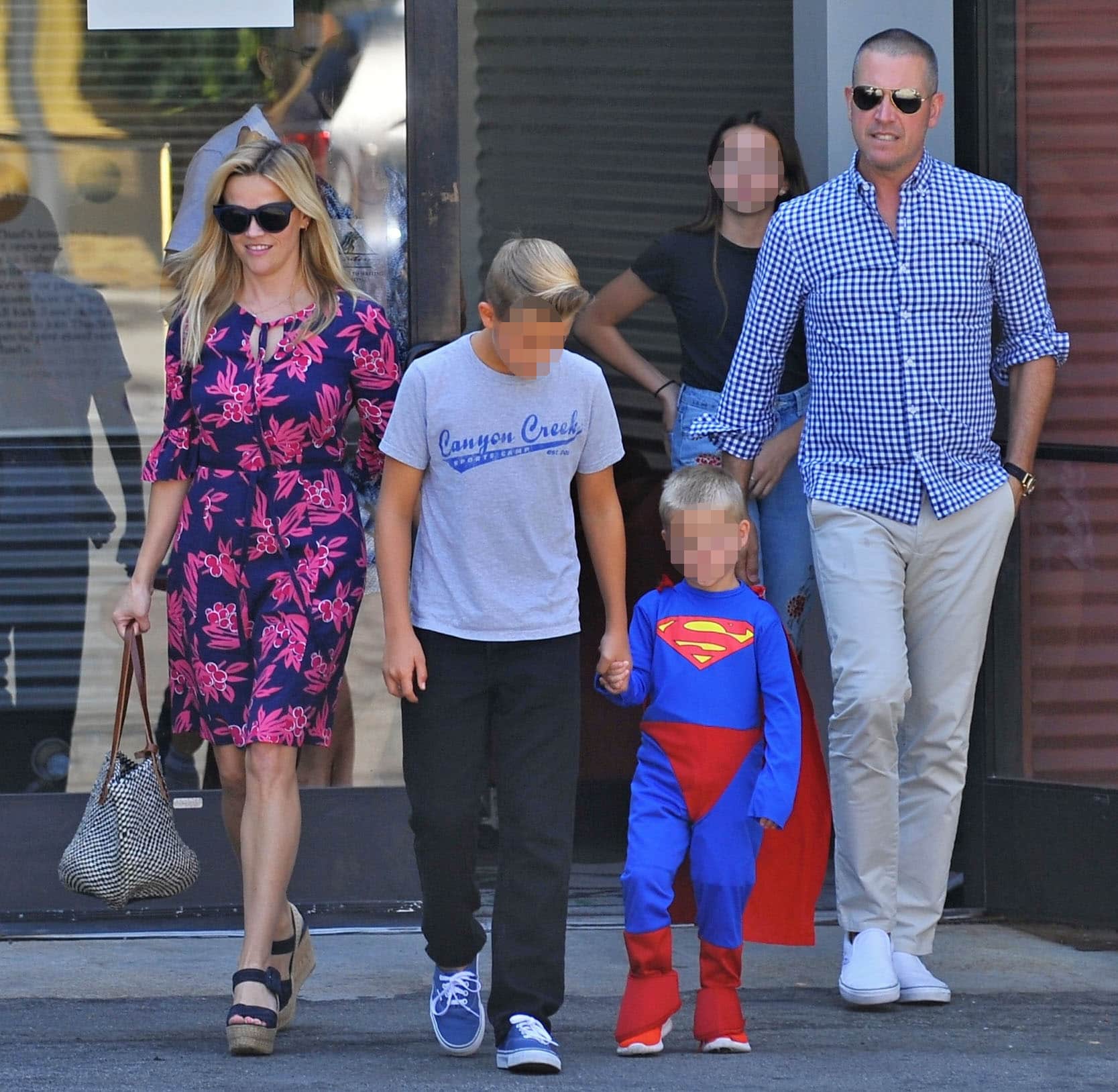 Reese Witherspoon goes to church with her family in a conservative knee-length floral dress on August 28, 2016