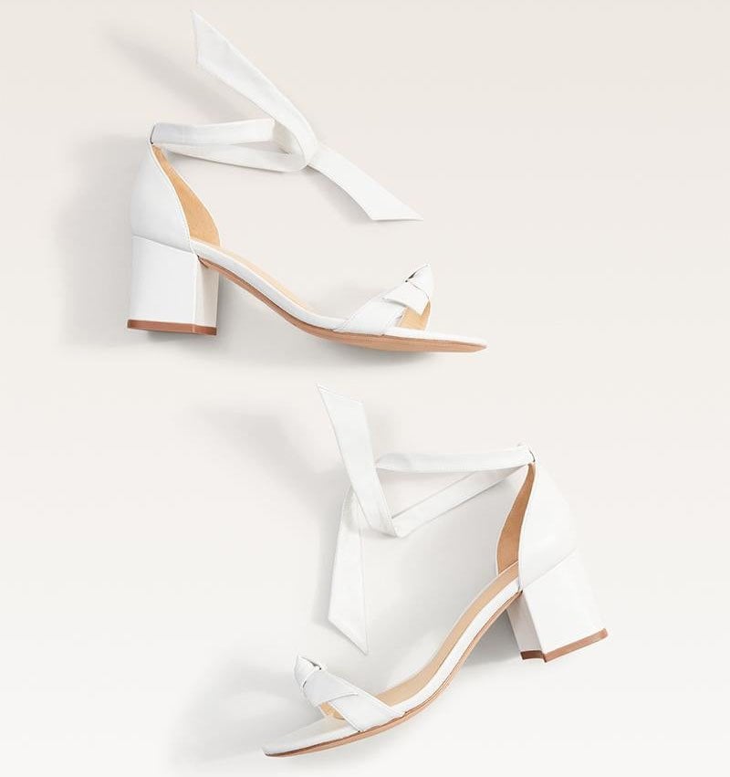 Alexandre Birman's classic Clarita bow sandals but with manageable block heels for effortless stride down the aisle