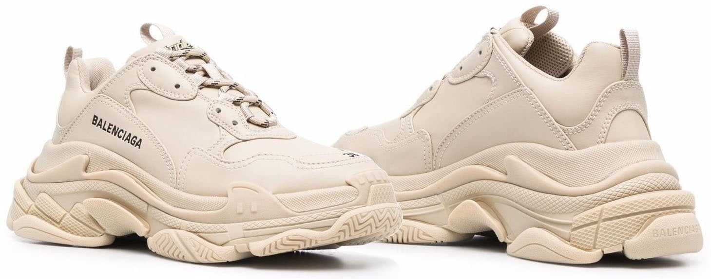 Featuring a triple-stacked sole, hence the name, Balenciaga's iconic Triple S has been updated with a soft-beige colorway and faux leather composition
