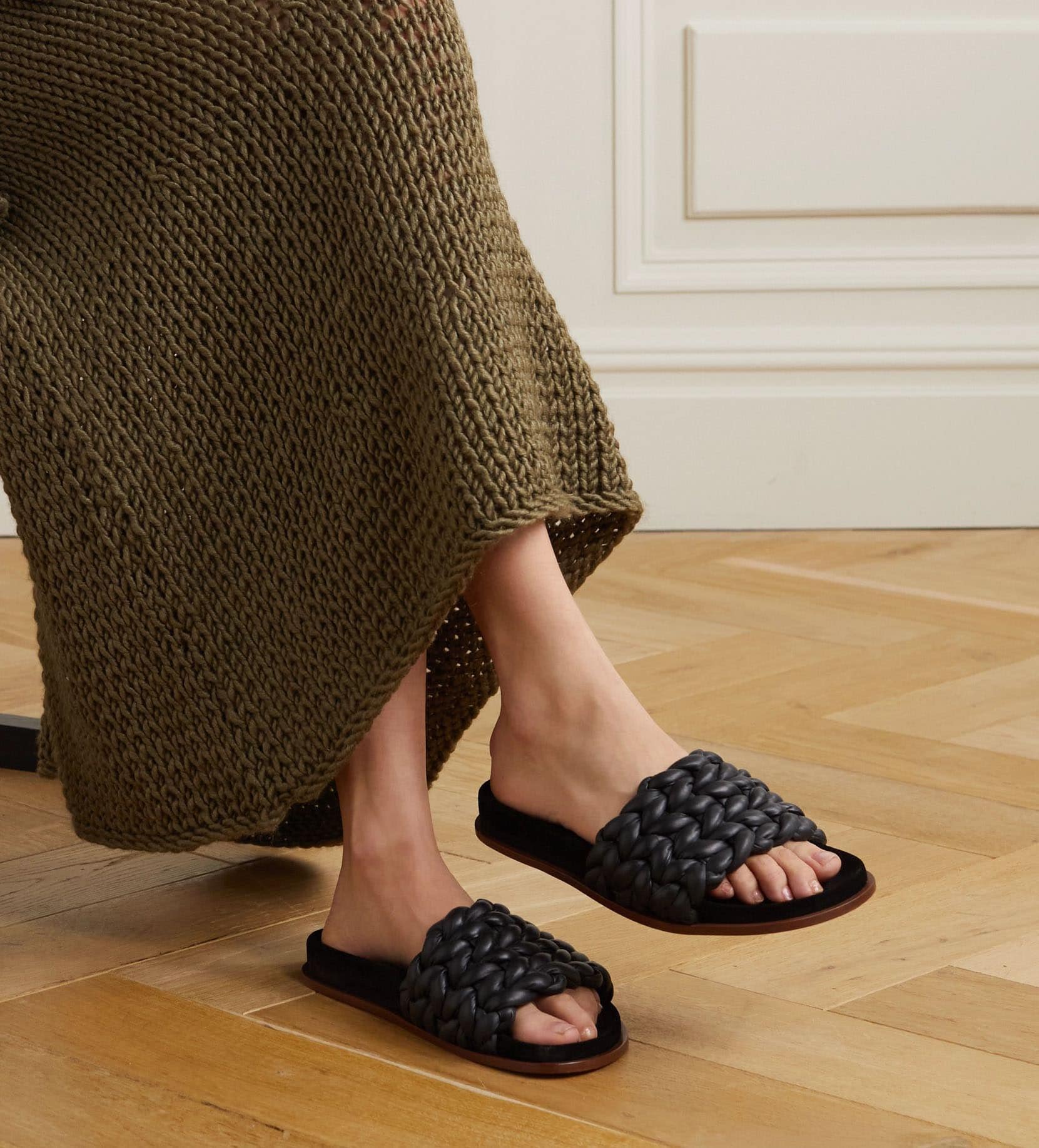 The Chloe Kacey slides are woven from panels of supple leather to achieve a braided finish