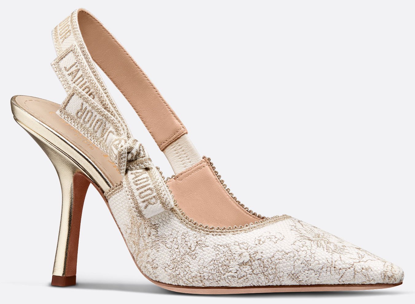 Refined and elegant, this luminous J'Adior pump is crafted in cotton with metallic embroidery and features a cotton ribbon slingback strap