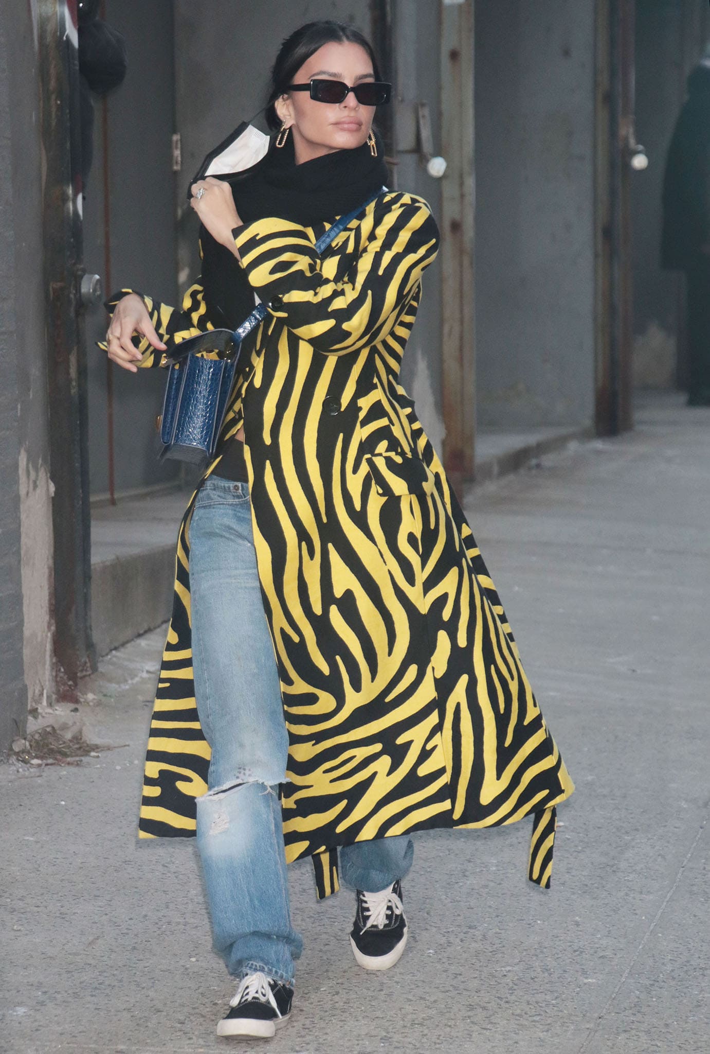 Emily Ratajkowski is unmissable in a yellow and black zebra-print coat from Proenza Schouler