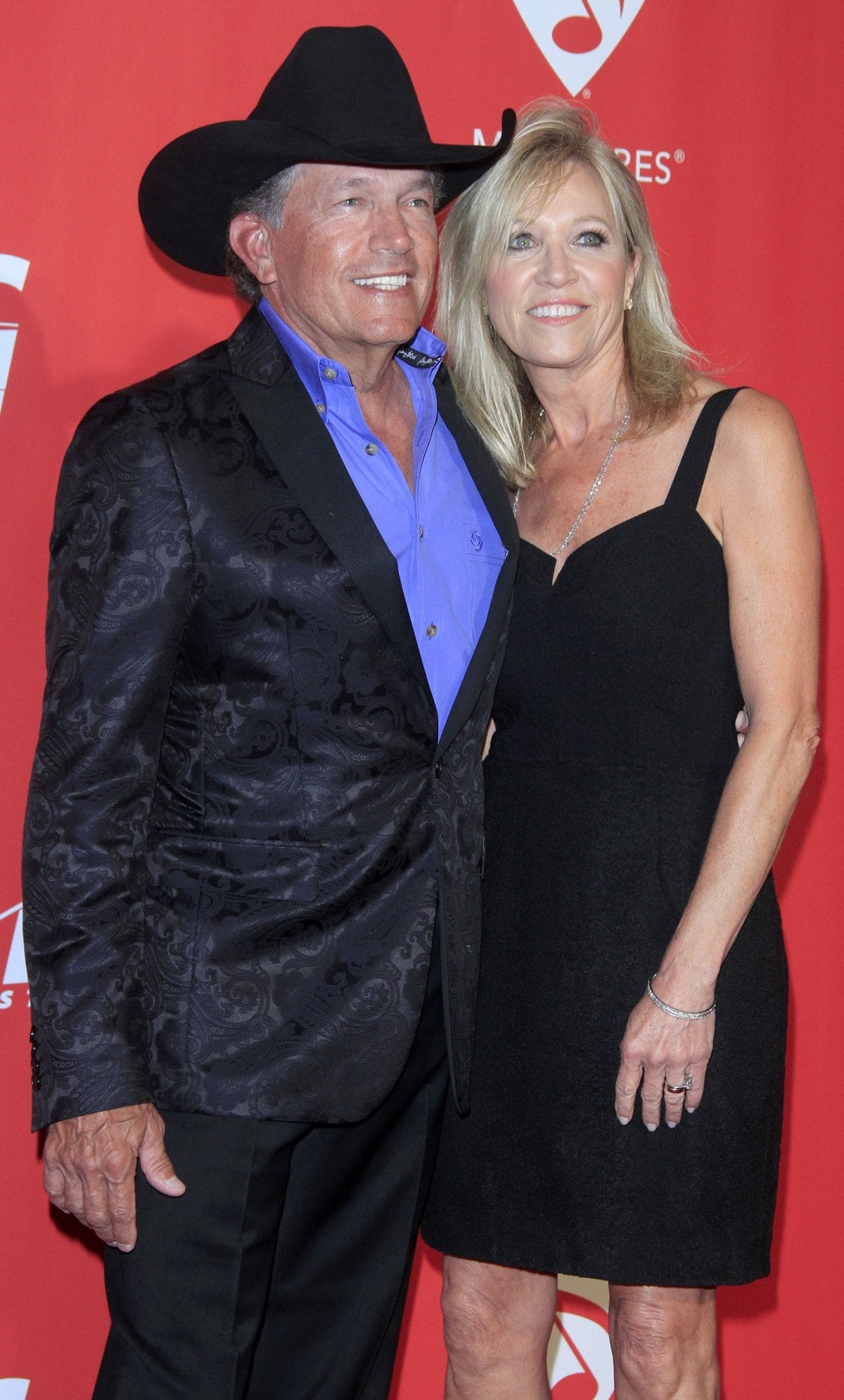 George Strait (L) and his wife Norma Strait attend MusiCares Person of the Year
