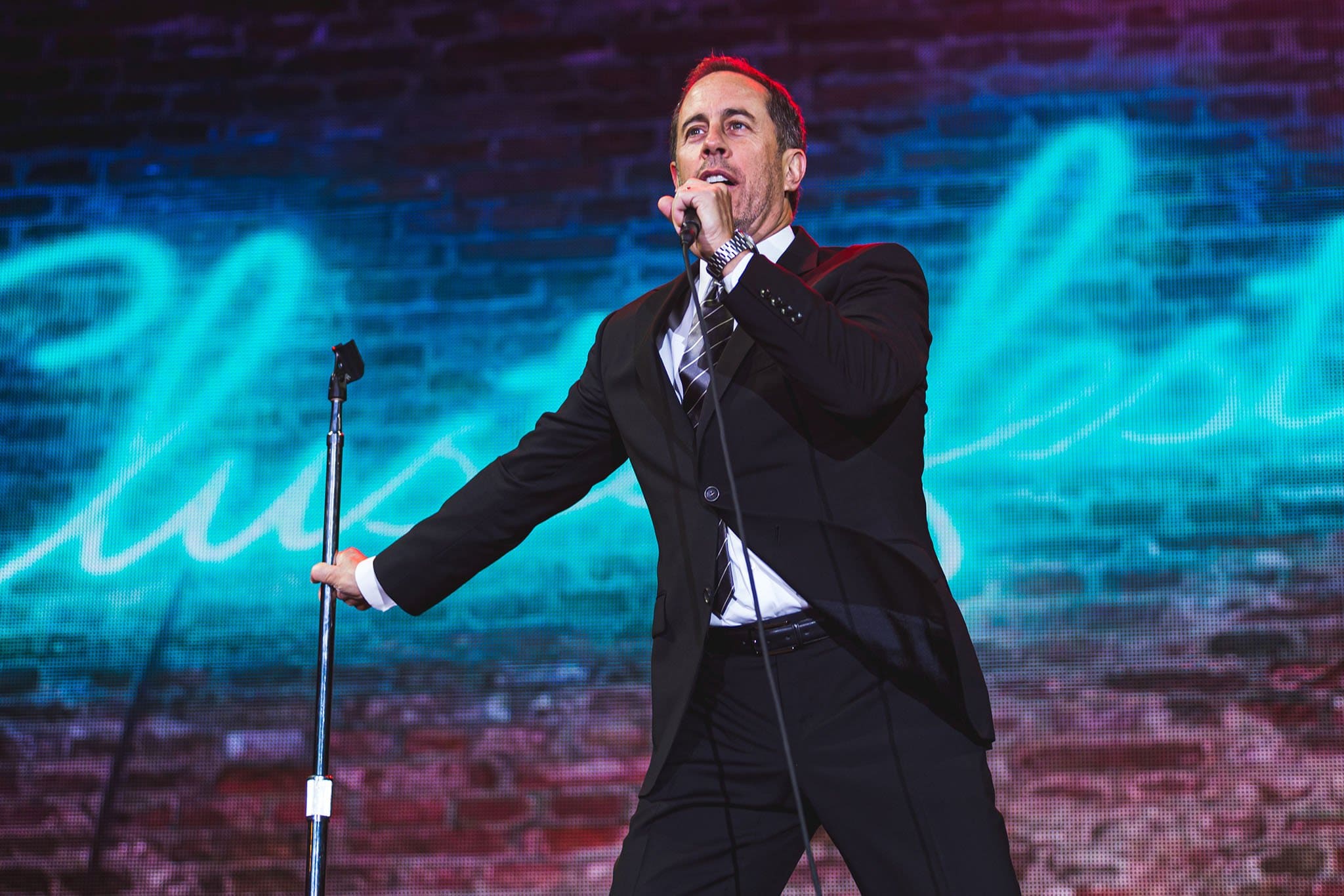 Jerry Seinfeld developed an interest in stand-up comedy after brief stints in college productions and rose to fame in 1989 when he created the sitcom Seinfeld