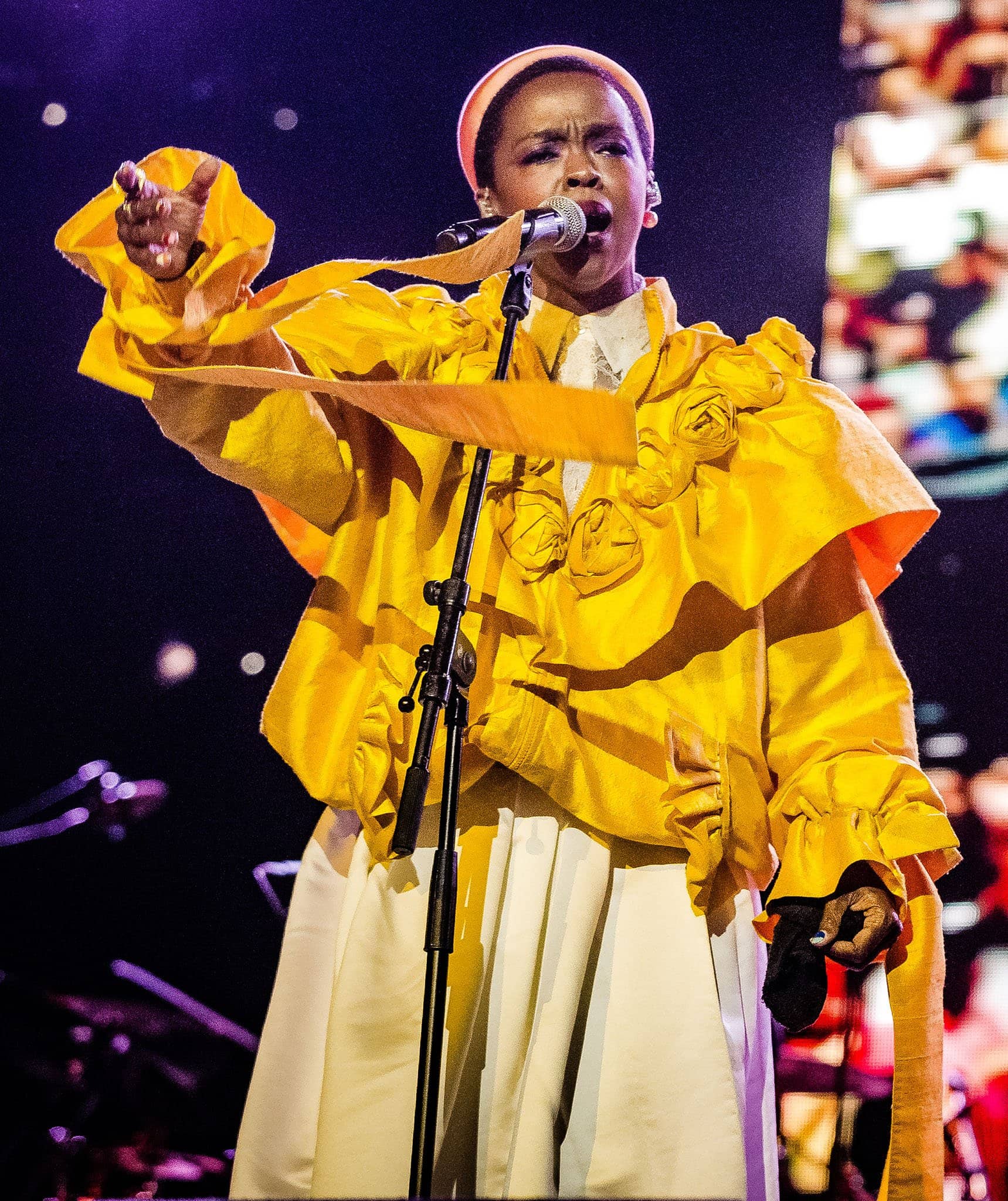 Lauryn Hill, emerging from a musically oriented upbringing, gained fame as a member of the Grammy-winning Fugees in the 1990s and currently possesses a net worth of approximately $9 million