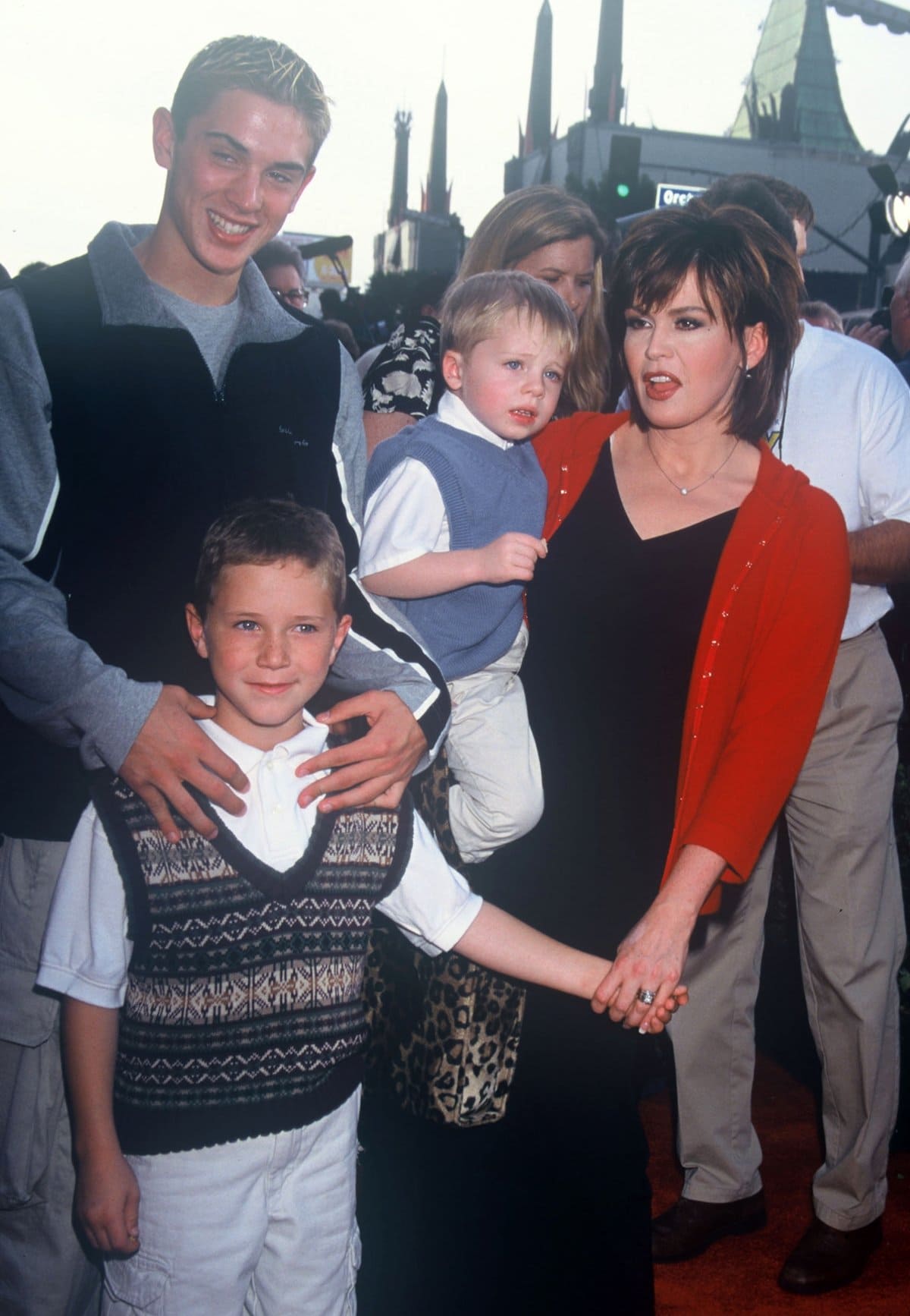 Marie Osmond with her sons Stephen, Michael, and Brandon at the premiere of "Toy Story 2"