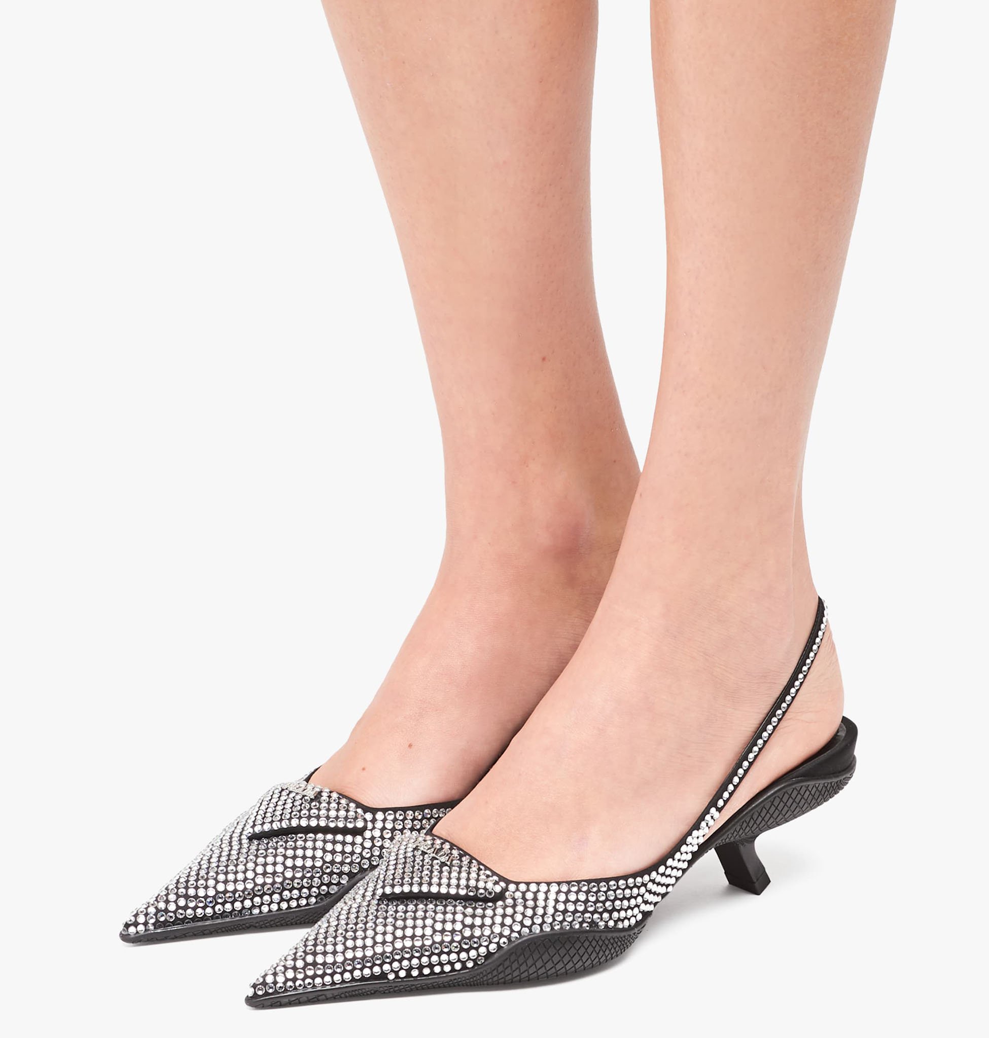 A glimmering modern Cinderella shoe with a comfy comma heel made of rubber shell