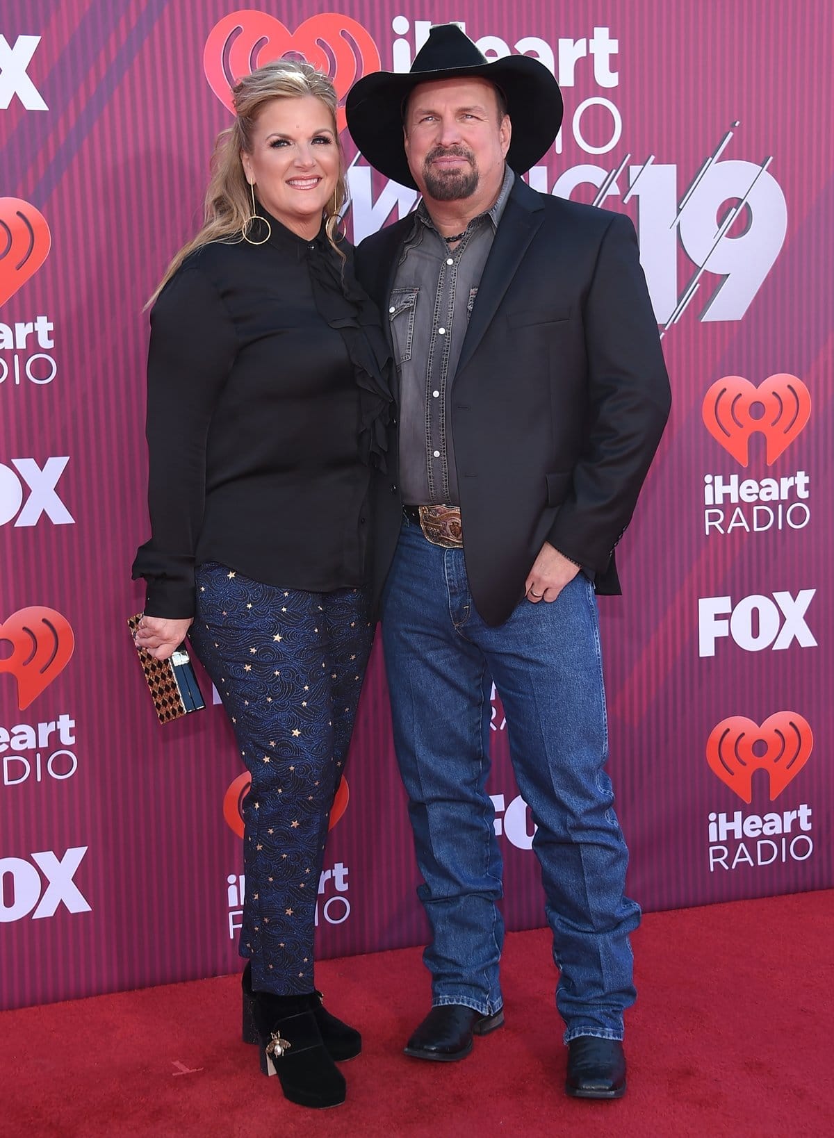 Trisha Yearwood and her husband Garth Brooks arrive for the iHeart Radio Music Awards 2019