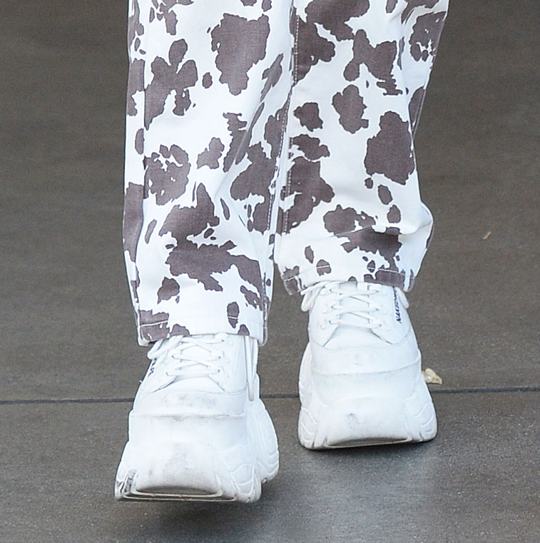 Vanessa Hudgens adds a sporty element to her quirky outfit with Naked Wolfe Sporty White leather sneakers