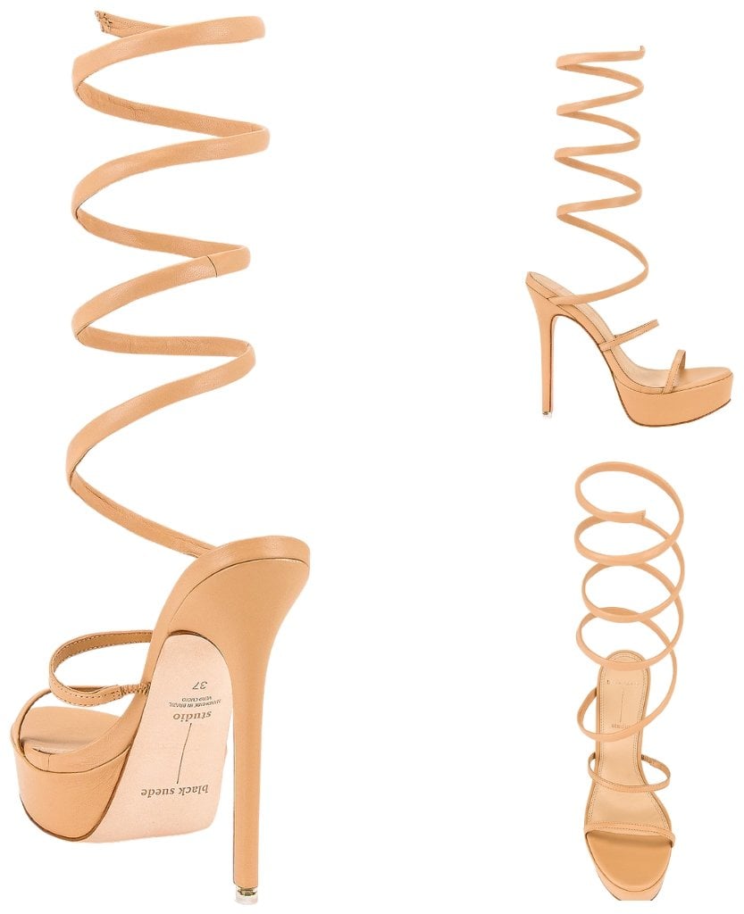 A wraparound ankle strap maximizes the modern allure of a standout sandal lifted by a bold platform sole