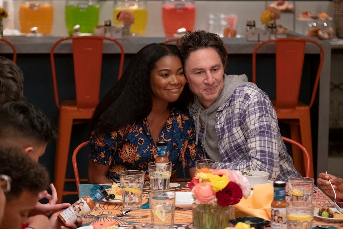 Gabrielle Union as Zoe Baker and Zach Braff as Paul Baker in the 2022 American family-comedy film Cheaper by the Dozen