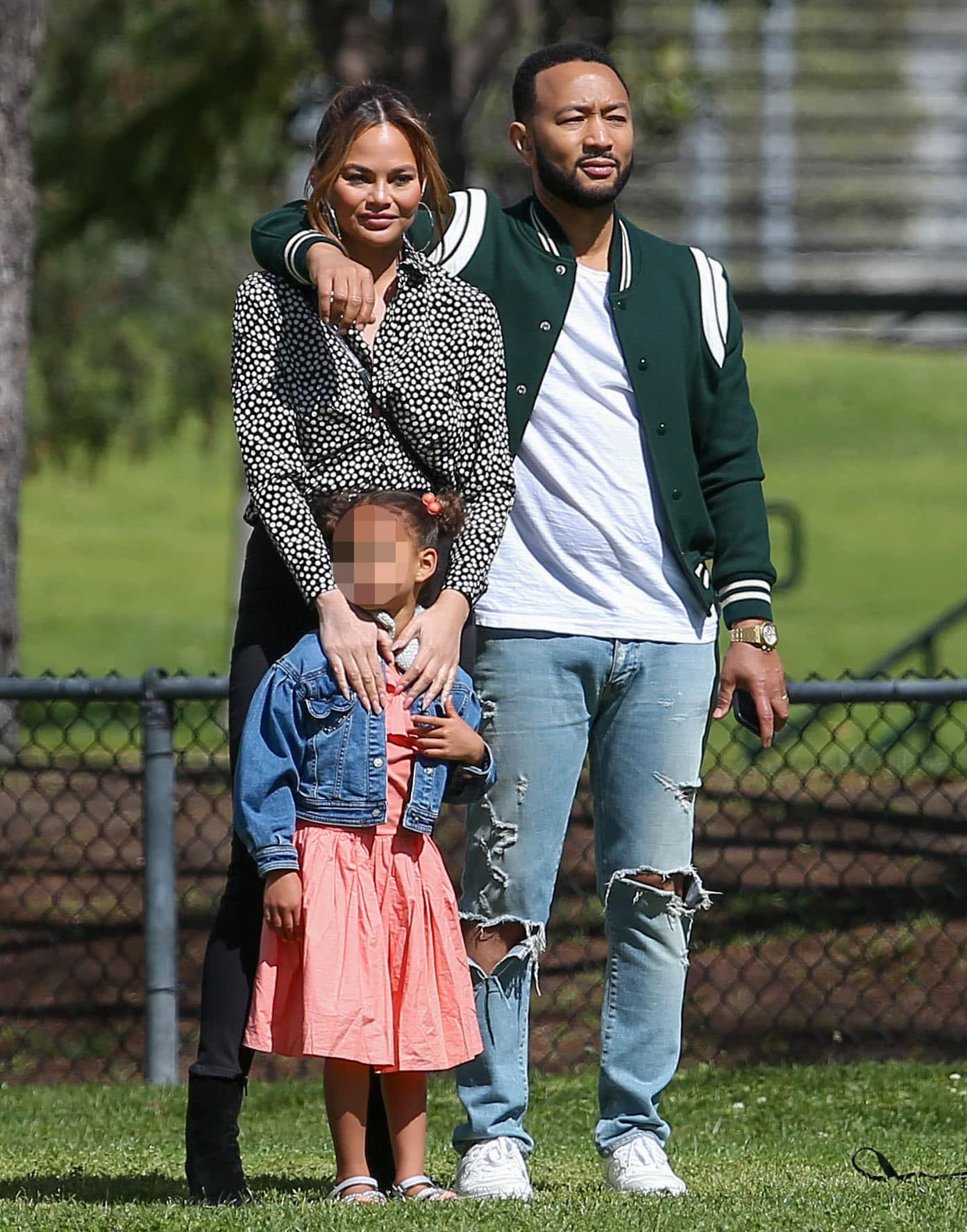 Chrissy Teigen, John Legend, and Luna watch Miles' baseball game in Los Angeles on March 5, 2022