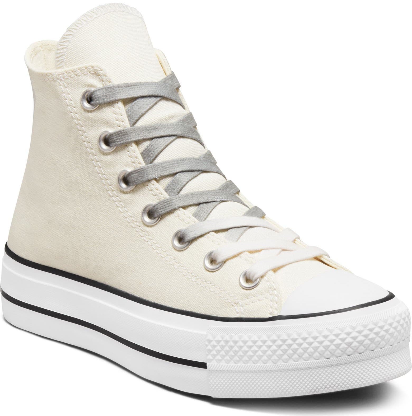 These Converse kicks are defined by the high-top silhouette and platform rubber soles