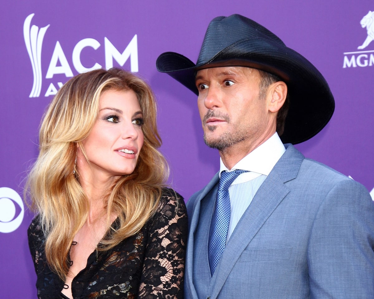 Faith Hill looks adoringly at Tim McGraw, who offers a playful expression as they arrive at the ACM Awards
