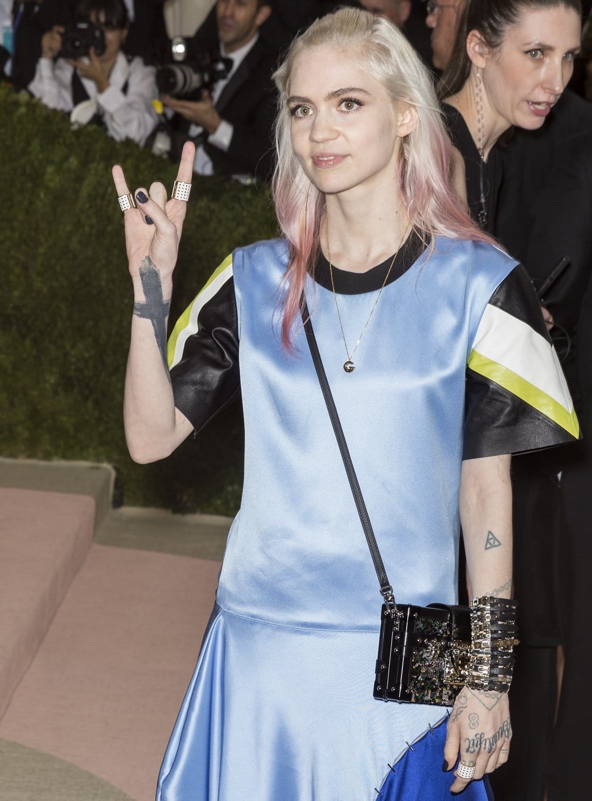 Grimes wearing Louis Vuitton by Nicolas Ghesquiere at the "Manus x Machina: Fashion in an Age of Technology", the 2016 Costume Institute Gala at the Metropolitan Museum of Art