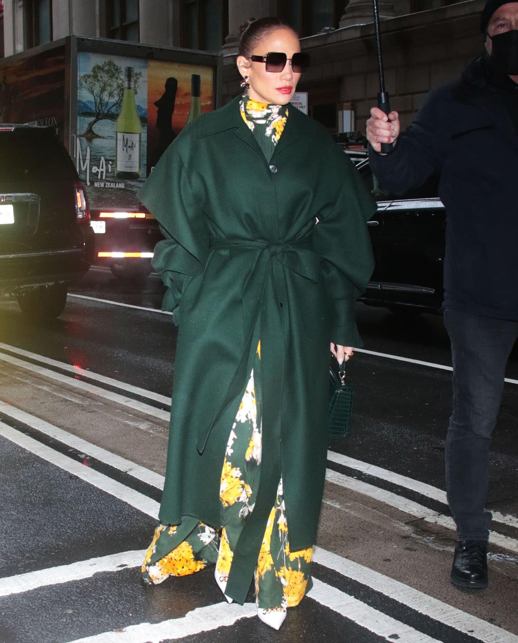 Jennifer Lopez wows in Del Core coat and floral silk maxi dress for her The View appearance on February 4, 2022