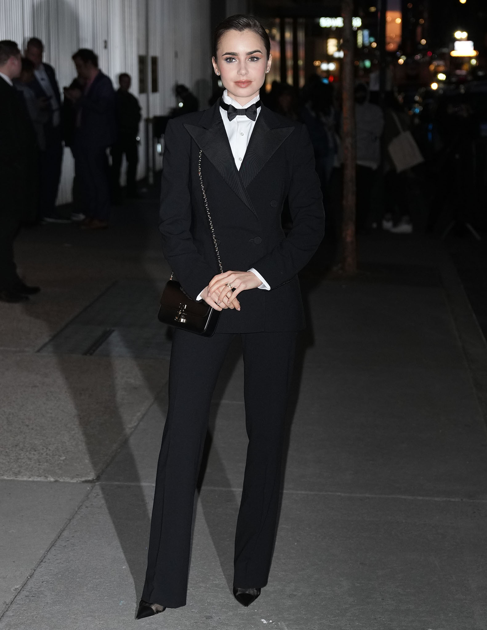 Lily Collins trades her feminine Emily in Paris ensembles for an androgynous tuxedo by Ralph Lauren