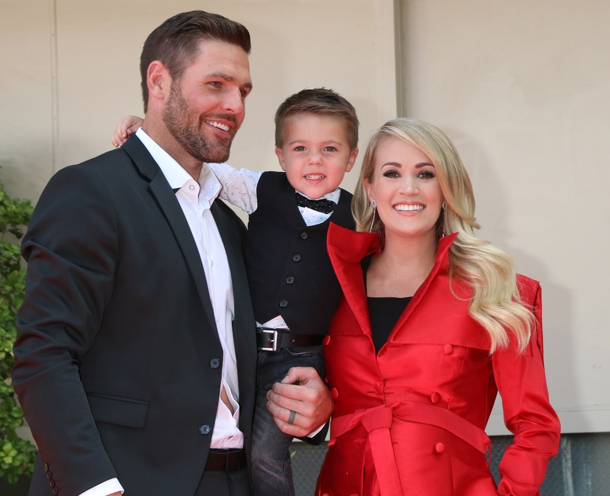 Carrie Underwood was supported by her husband Mike Fisher and their adorable 3-year-old son, Isaiah, while receiving a star on the Hollywood Walk of Fame