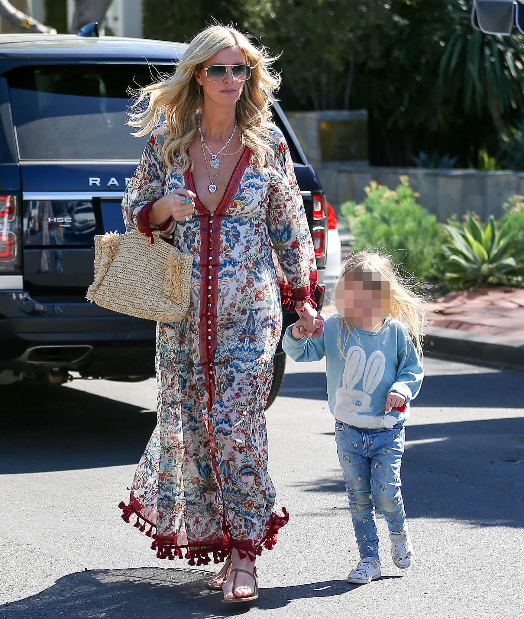 Nicky Hilton showcases her growing baby bump in Alice+Olivia Alexandria plunging floral maxi dress
