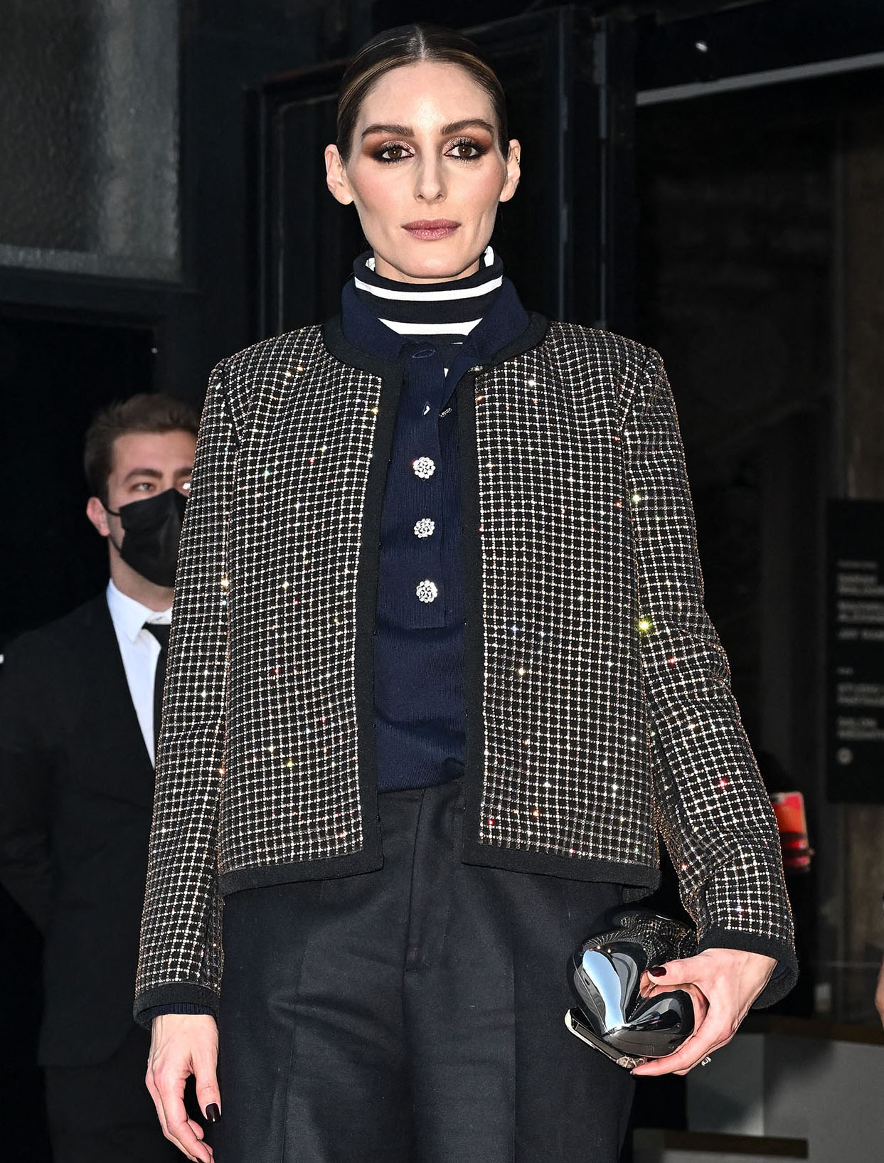 Olivia Palermo opts for vampy look with smokey eye-makeup and a sleek bun