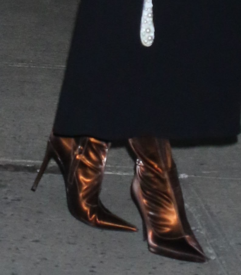 Sandra Bullock pairs her paint-effect floral-print midi dress with bronze Giuseppe Zanotti Ametista boots
