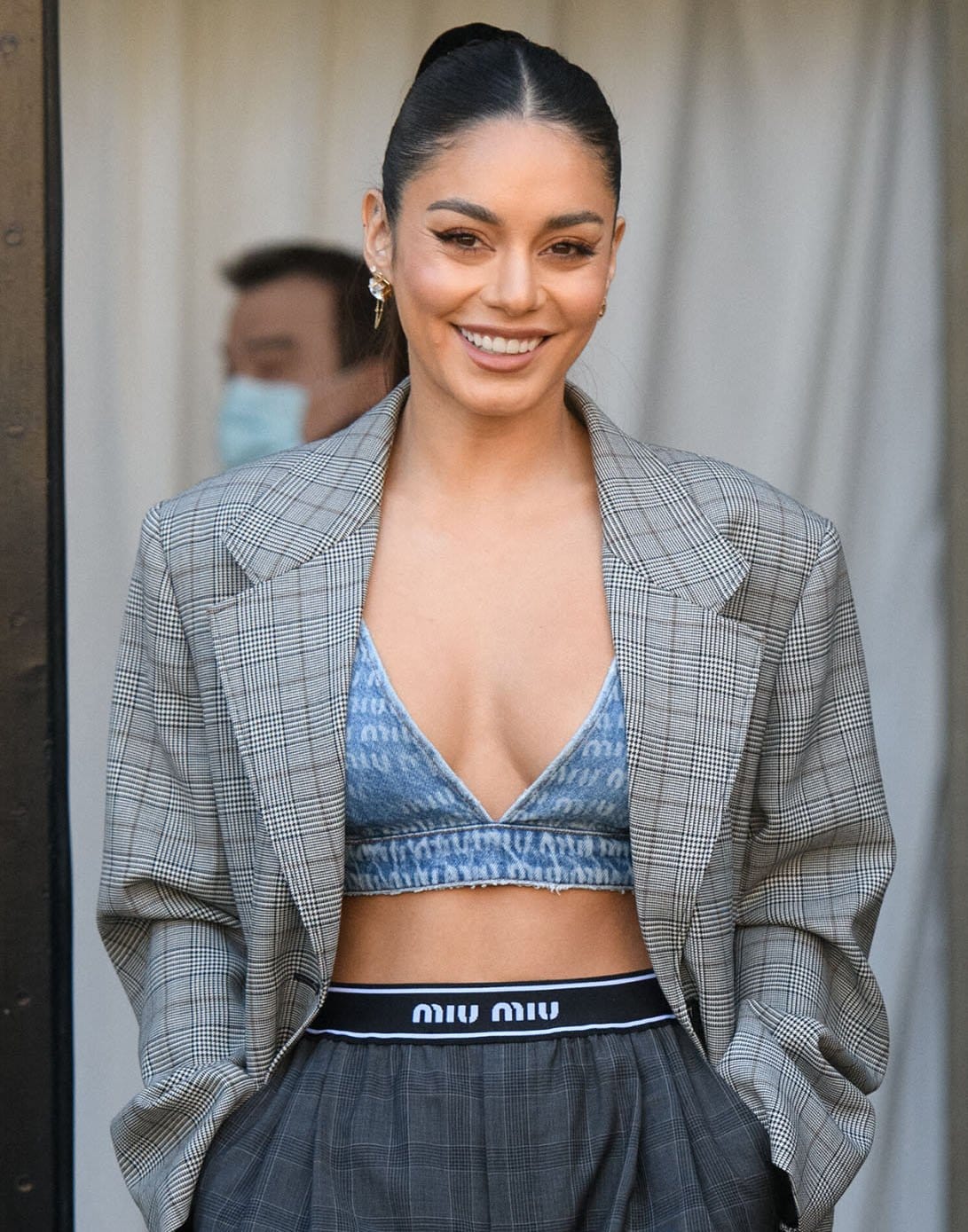 Vanessa Hudgens pulls her tresses into a slick ponytail and wears winged eyeliner and nude lipstick