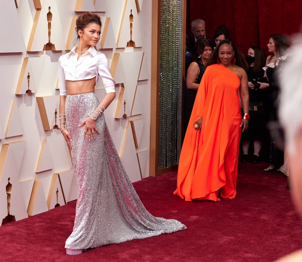 Zendaya dazzles in Valentino Haute Couture paired with Tan-Go leather platform pumps and stacked Bvlgari Serpenti bangles at the Academy Awards in Hollywood