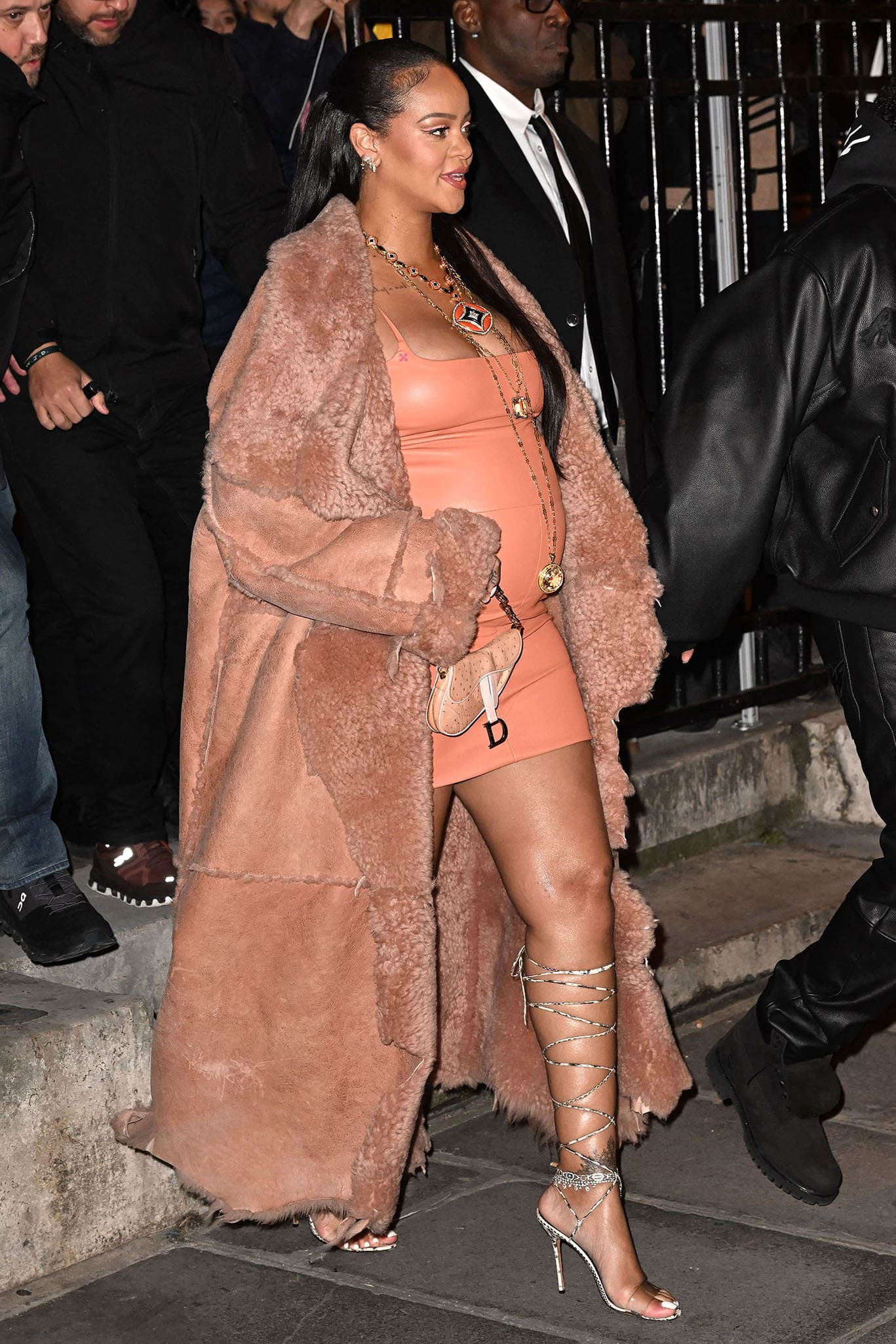 Pregnant Rihanna attends the Off-White Fall/Winter 2022 runway show during Paris Fashion Week on February 28, 2022