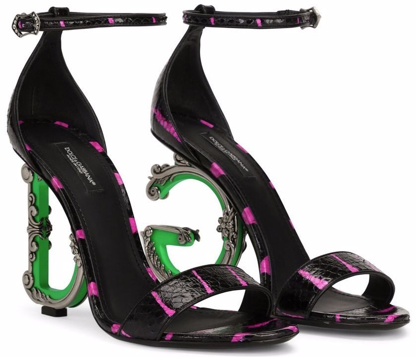 Made from printed Elaphe, these Dolce & Gabbana sandals are defined by the sculptural baroque DG heels with neon trims