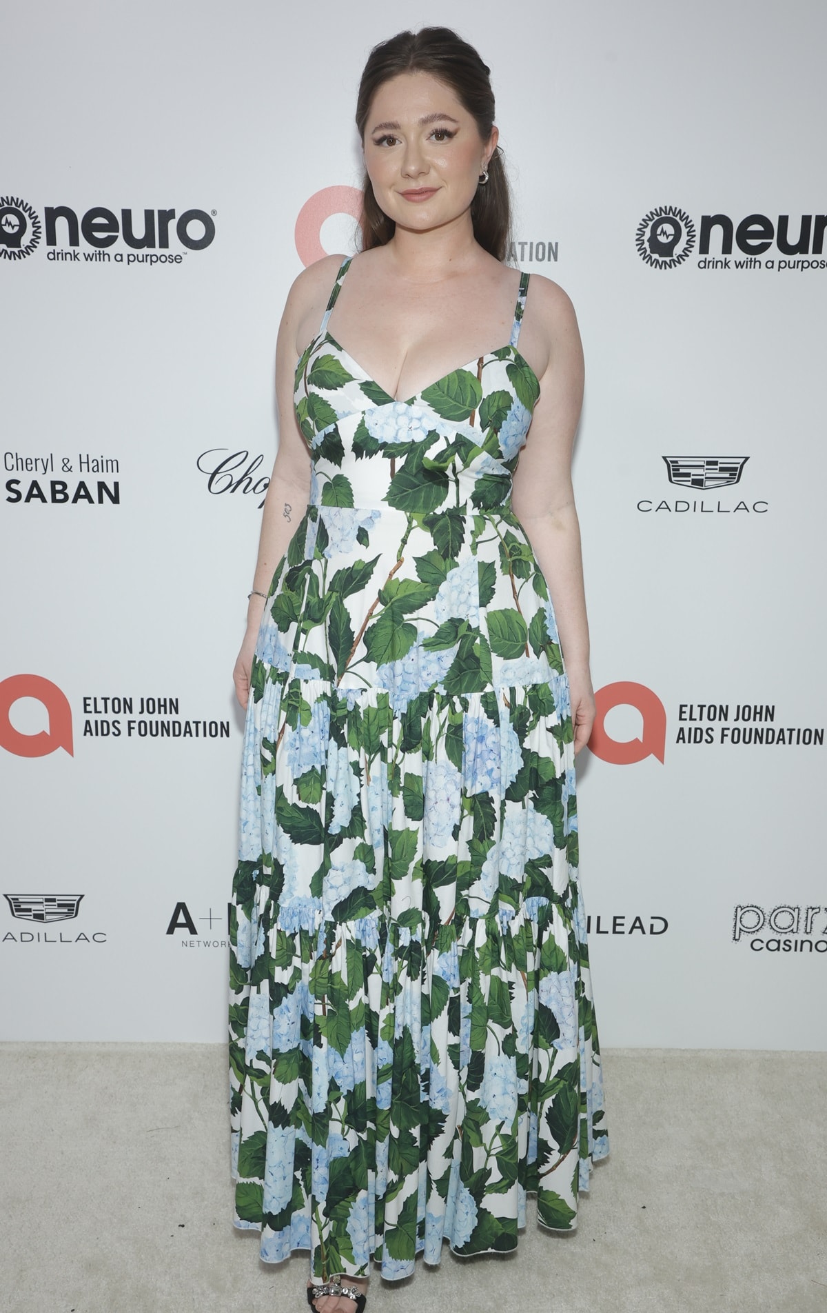 Emma Kenney stunned in a floral dress at the Elton John AIDS Foundation's 31st Annual Academy Awards Viewing Party