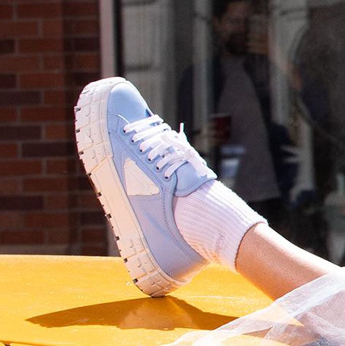 Gigi Hadid completes her monochromatic blue look with Prada Double Wheel sneakers