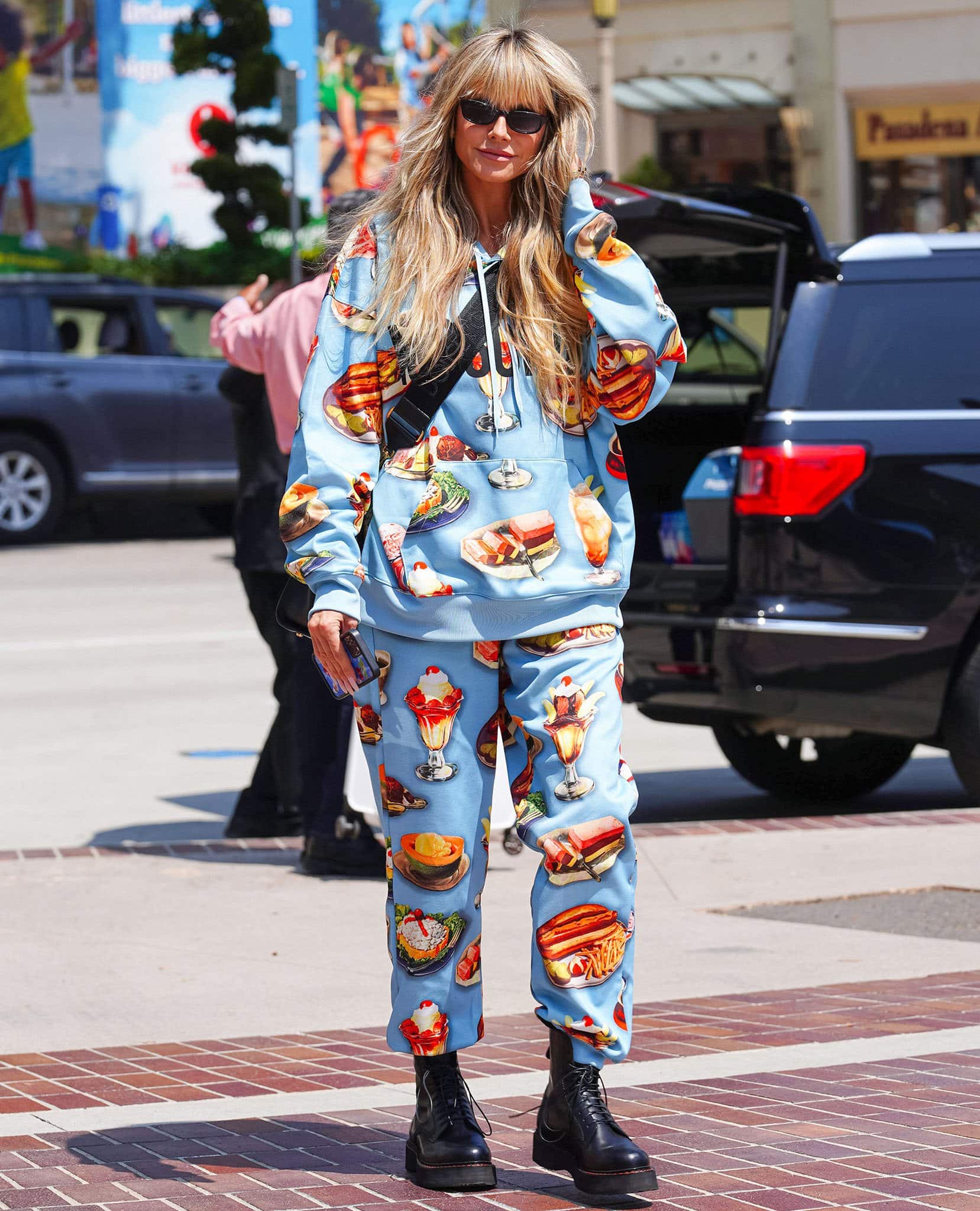 Heidi Klum makes a quirky arrival in a diner food tracksuit for America's Got Talent auditions