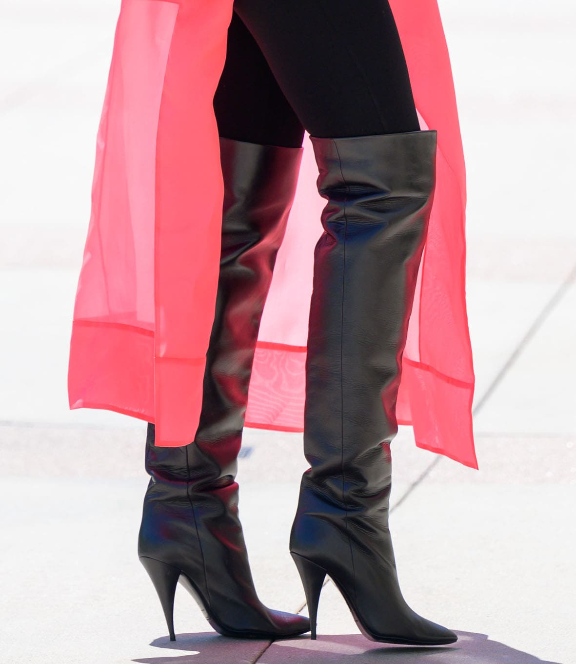 Heidi Klum completes her sleek look with Saint Laurent Kiki over-the-knee boots