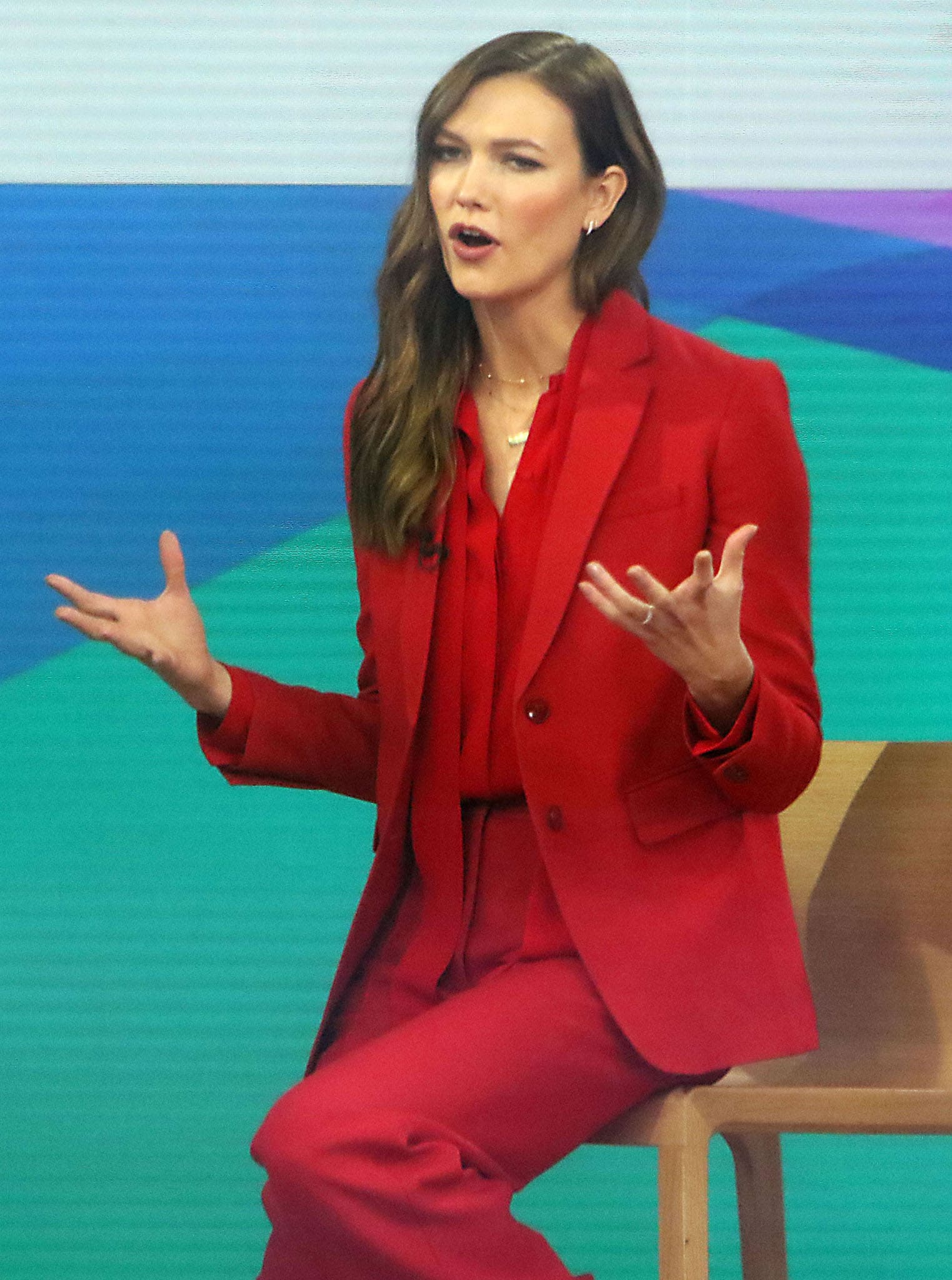 Karlie Kloss talks about motherhood and Kode with Klossy in Maison Valentino red suit on Today Show on April 6, 2022