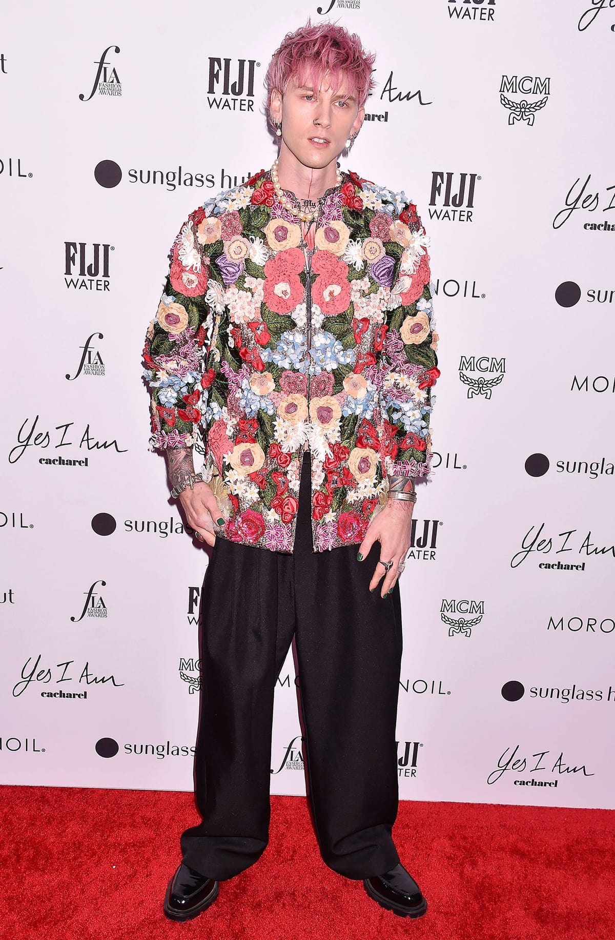 Machine Gun Kelly in a floral Dolce & Gabbana jacket at The Daily Front Row's 6th Annual Fashion Los Angeles Awards