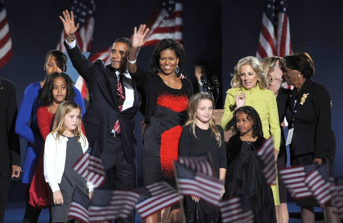 Michelle Obama wore a red-and-black sheath by Narciso Rodriguez when celebrating Barack Obama's win