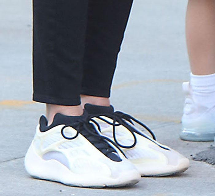 Nicky Hilton completes her chic casual outfit with Adidas Yeezy 700 V3 Azael sneakers