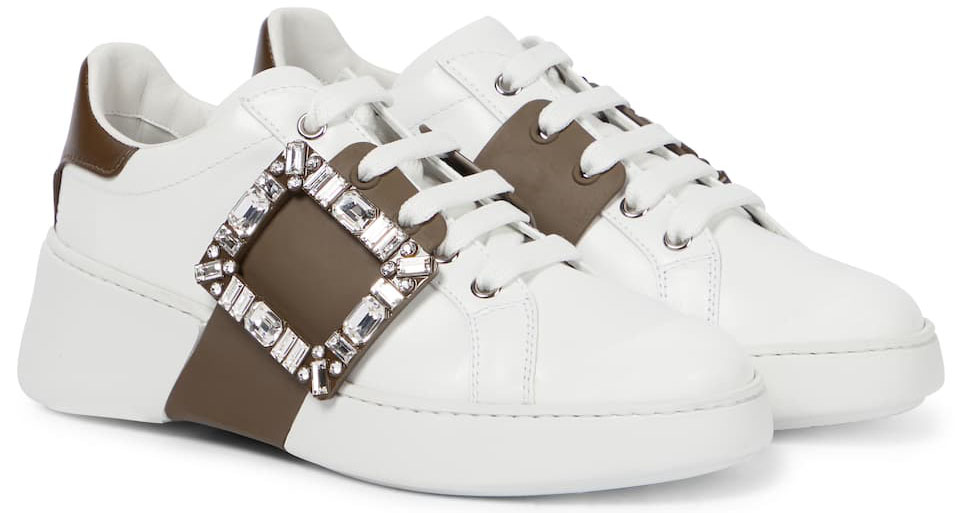 A classic everyday white sneaker elevated with a crystal side buckle